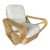 Designed in the manner of Paul Frankl, this six-strand rattan lounge chair features square pretzel arms and a Classic...