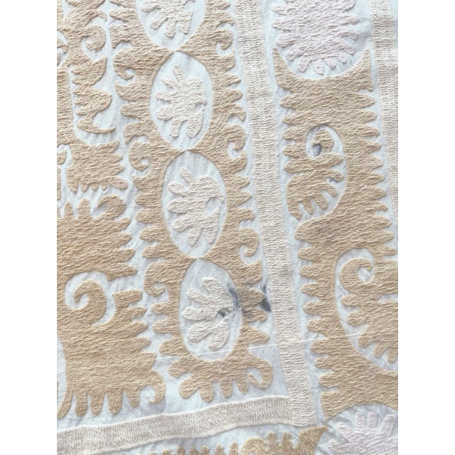 Decorative Vintage Suzani from Bukhara, circa 1960s era. There are stains on this suzani. Dimension; 50'' x 55'' inches /...