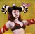 Conjuring a Life by Tammi Otis | Oil Painting of a woman with horns and a bird For Sale