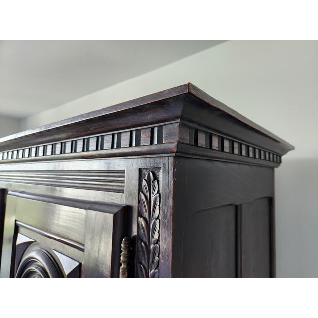 Early 20th Century Antique Hand-Carved Renaissance Revival 3-Door Armoire/Cabinet in Dark Oak For Sale - Image 5 of 6