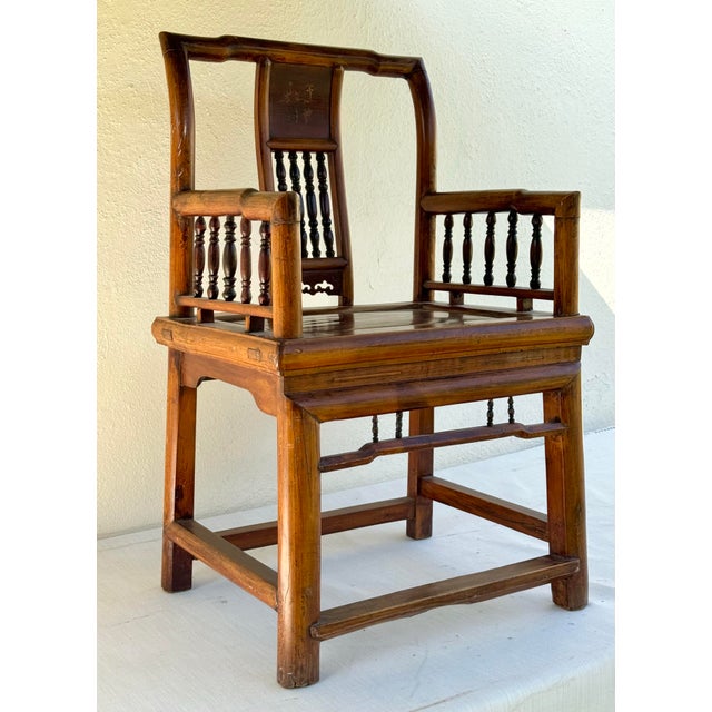 Lovely antique Chinese elm wood armchair, likely Ming, 19th century. 4 legs secured by 4 stretchers with dowel joinery,...