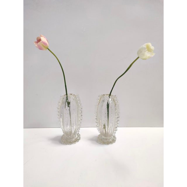 Made in Italy, 1930s - 1940s Made in transparent bullicante hand-blown Murano glass by Ercole Barovier. These vases are...