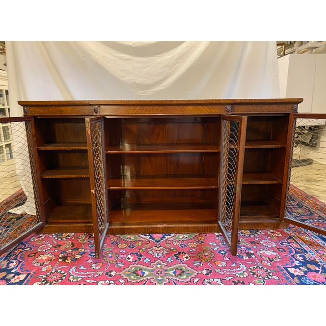 For your dining room, library or hallway, a handsome mahogany Regency style case piece. This was likely made at the end of...