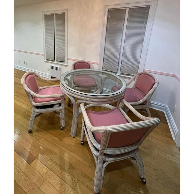 Pencil Reed dining set with the mauve pink seat cushion, which can be taken off and machine wash separately This dining...