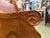 Reclaimed from an old church, this American oak pew features decorative wooden flourishes on the arms. Each end also has a...