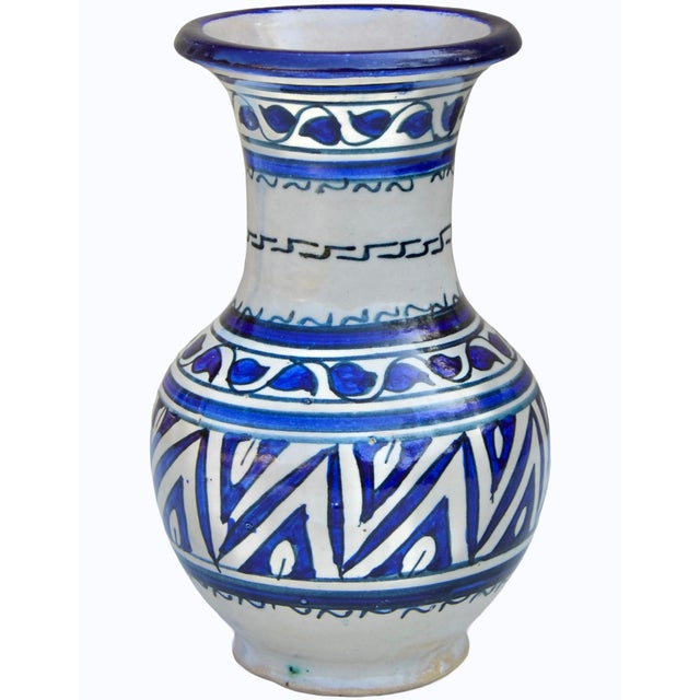 Stunning one-of-a-kind antique Moroccan ceramic vase meticulously handcrafted and glazed exhibiting an eye-catching hand-...
