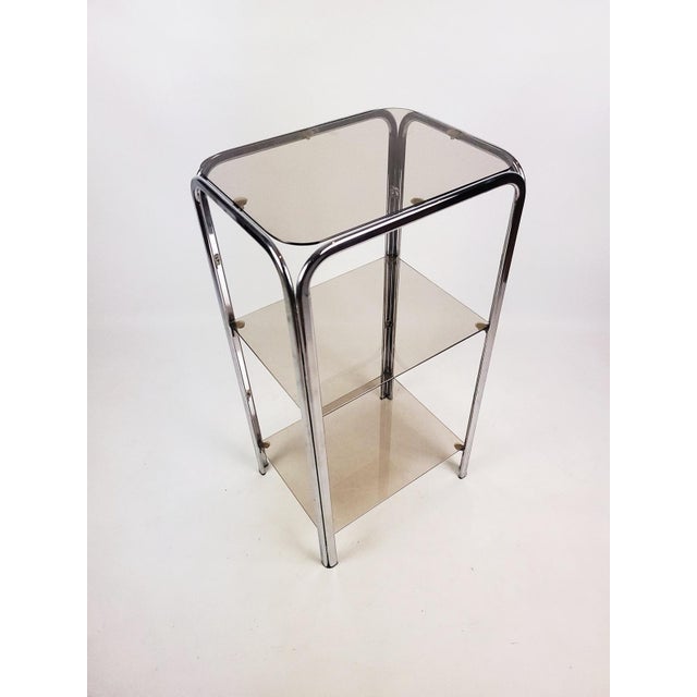 Vintage Chrome Shelving Unit with Glass Shelves, 1970s, in Good conditions. Designed 1970 to 1979
