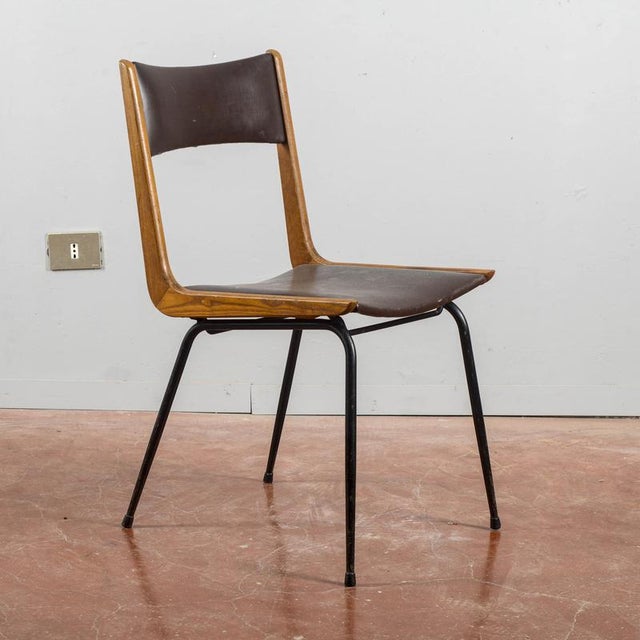 This "boomerang" chair, attributed to the renowned architect and designer carlo de carli and dating back to the 1950s, is...