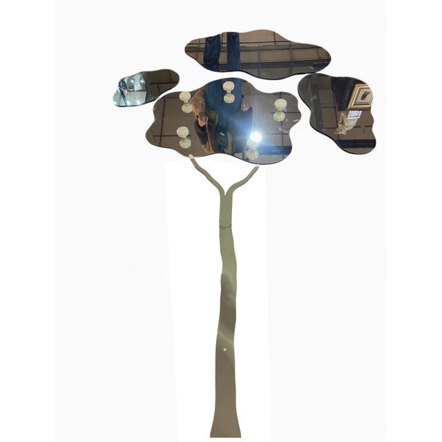 Rare mirror/wall hanging from the 1970s, the mirror consists of 4 mirrors forming a tree on one of which there are 5...