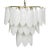 Three tiers of handcrafted glass petals drape the gorgeous Lotus chandelier. For an added touch of luxe, the metal frame...