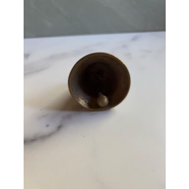 Lovely vintage mid-century bell. Made of brass. Prnate base with Maltese cross on top. Working clacker. Stamped "Malta".