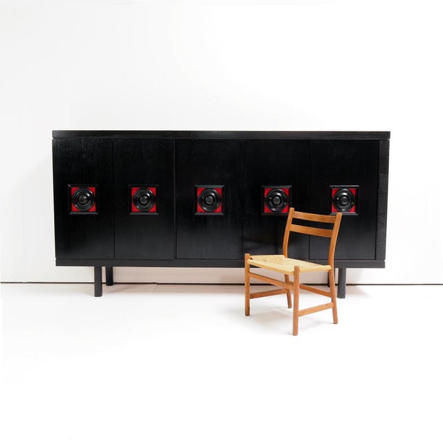 This Belgian Brutalist sideboard from the 1960s is a beautiful mid-century piece of vintage furniture with a strong and...