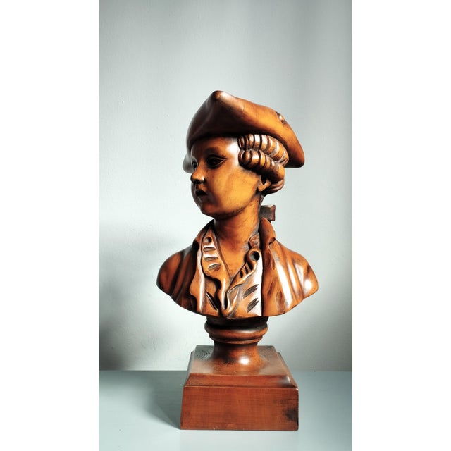 An intriguing vintage bust carved from solid wood, depicting an 18th/19th-century sailor. It dates to around the...