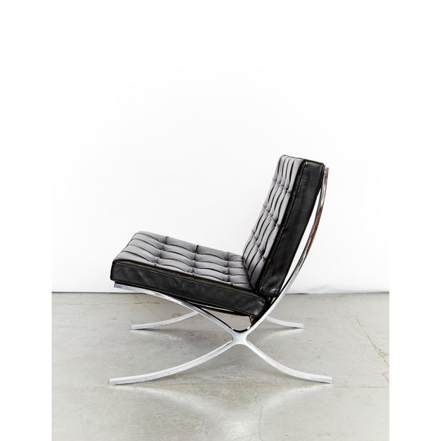 Upholstered in black leather. Good used condition. The seat has been repaired in two places with cracks. Otherwise,...