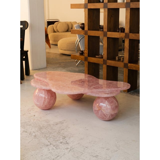 Bring a sense of elegance and artistry into your home with this handcrafted Rose Quartz Coffee Table. Designed with a...