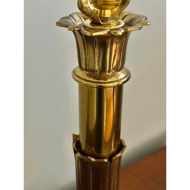 A sculptural vintage brass table lamp by Tyndale, newly rewired and restored while retaining its original branded socket...