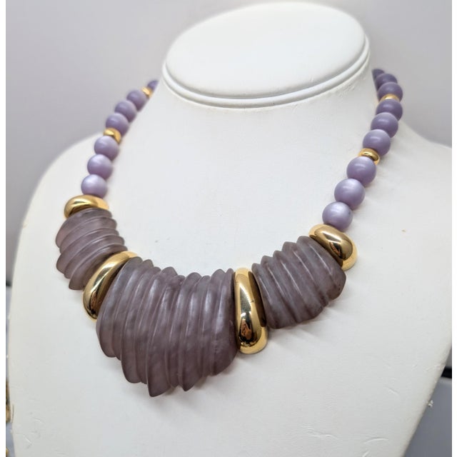 1985 goldtone and purple "sherbet" resin ridged molded 3 plaques with pink "moonglow" beads collar necklace with fold over...