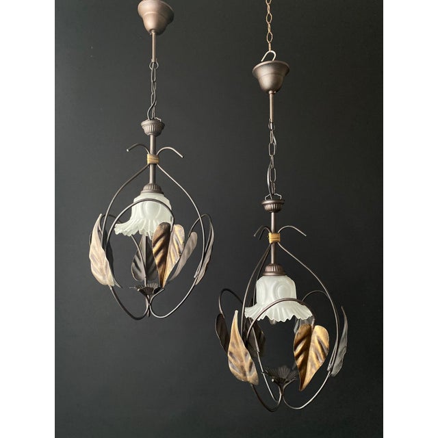 The chandeliers are made of wrought iron with a matte finish. Decorated with glass. Unusual and interesting handwork. for...