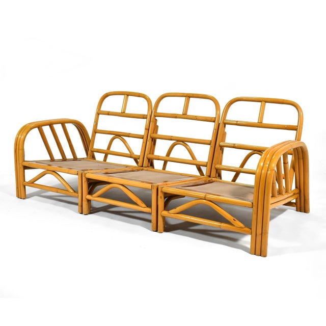 This terrific Ficks Reed rattan sofa is perfect for your mid-century pad or tropical Tiki room. The "Angles" line strikes...