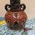 Add a touch of bohemian elegance to your home decor with this striking vintage studio art pottery vase. Featuring a...