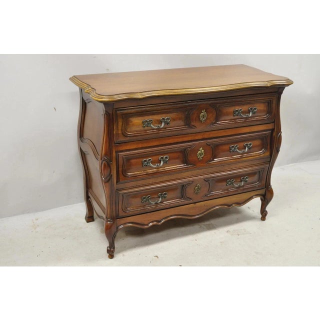 Vintage French Louis XV Country Style Sienna Cherry Bombe Commode Chest Dresser. Item features panel carved sides, solid...