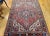 Vintage Heriz Area Rug, Handwoven Geometric Pattern, Red & Navy, 5’ X 7’ For Sale - Image 4 of 11