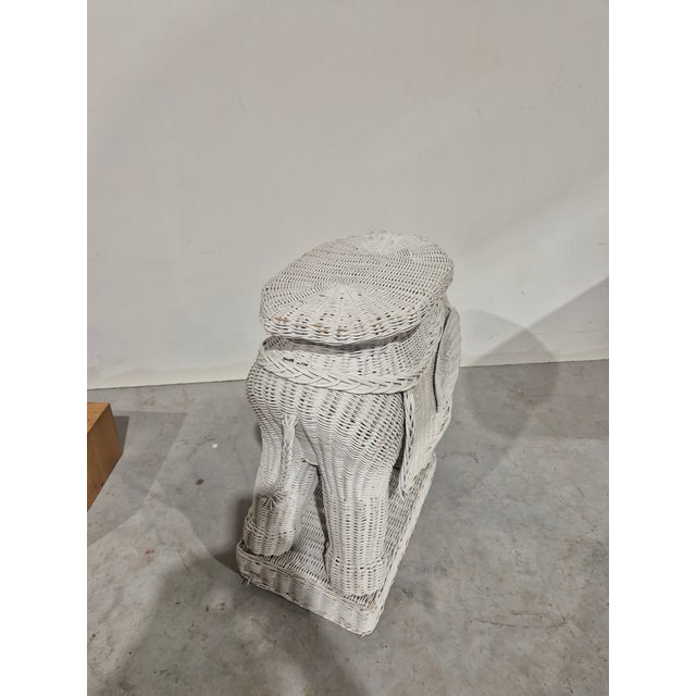 Beautiful wicker elephant from teh 1970's. Great to use as a side table or plant table