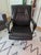 Authentic Poltrona Frau Forum Executive office chair upholstered in espresso Pelle Frau leather, with a polished aluminum...