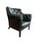 Rich green leather with diamond tufting Elegant nailhead trim and wooden legs Curved arms and deep seat Chesterfield-...