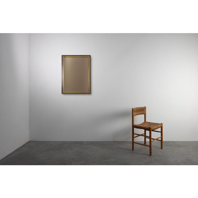 Belgium / 1980 / Mirror / Belgo Chrome / metal, copper and (fume)mirror / Mid-century This elegant mid-century mirror by...