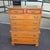 A handsome 1960s American Colonial Revival cherry chest-on-chest featuring two short upper drawers over five full-width...