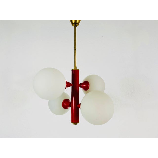 A midcentury chandelier by Kaiser made in Germany in the 1960s. It is fascinating with its Space Age design and four...