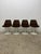 Set of four fully upholstered Tulip Side chairs with white swivel bases by Eero Saarinen for Knoll. These dining or side...