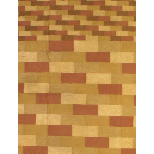 Add a touch of elegance to your home with this casual chic hand woven Kilim wool rug. Constructed on a loom by Nomad...