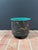 This vintage mid-century Mexican Texcoco pottery planter / cachepot features abstract figures that are hand carved into...