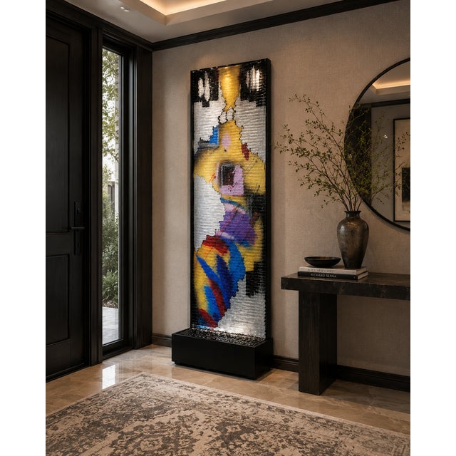 Dramatic vintage 1980s acrylic waterfall fountain with a sleek architectural form and glossy black finish. Standing nearly...