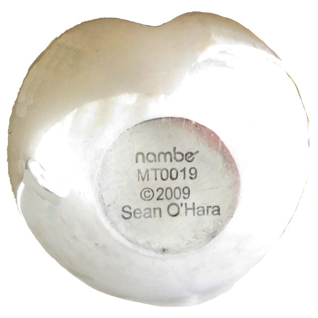 With their elegant simplicity, this pair of Nambe silver hued, heart-shaped bowls will enhance any decor from mid-century...