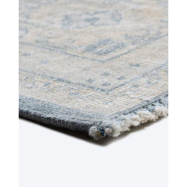 From Tabriz in Persia this is a classic vintage piece that will enhance any room setting. A distressed carpet is not an...