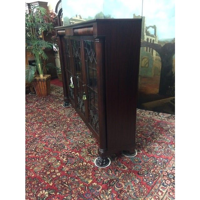 Item: Antique Mahogany Bookcase with Three Glass Doors. Age & Condition: Circa 1890-1910. Refinished and restored. Good, a...