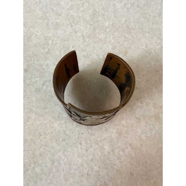 Metal Vintage Solid Copper & Silver Cuff Bracelet Featuring a Raised Mayan or Aztec-Style Figure For Sale - Image 7 of 7