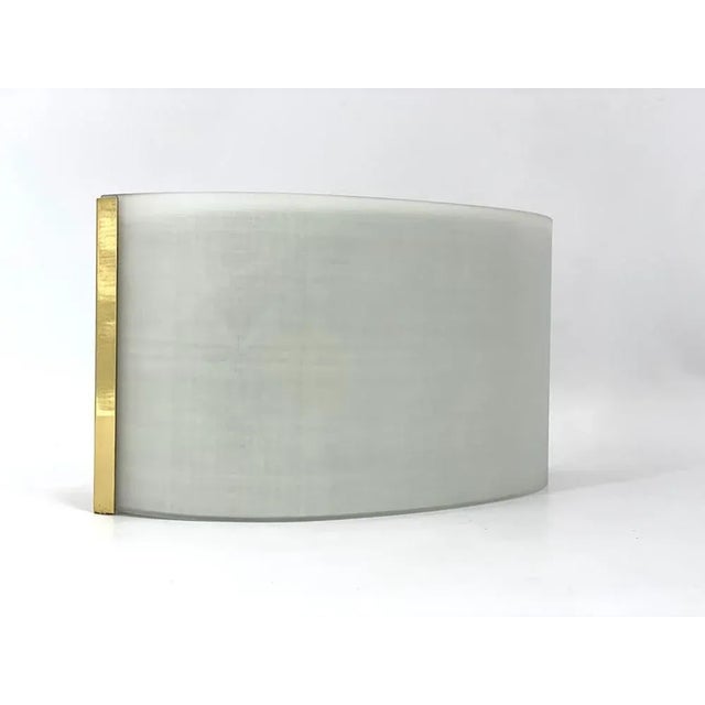 Vintage Italian appliament in opaque and gold metal, series available This model of wall lamp with chosen style can easily...