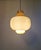 Scandinavian pendant light in mustard opaline glass. model: oplight 75 designer: hans-agne jakobsson manufacturer: staff...