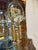 A beautifully crafted Howard Miller curio clock featuring a warm wood finish and glass-paneled cabinet. Designed to...