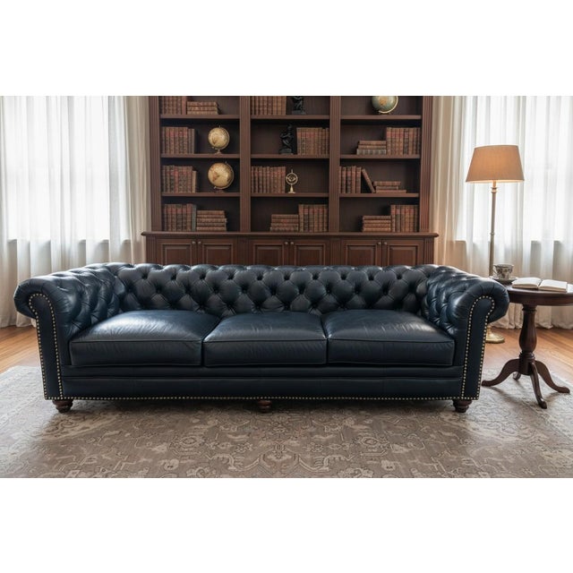 This impressive large Chesterfield sofa is a timeless statement piece, combining classic English design with exceptional...