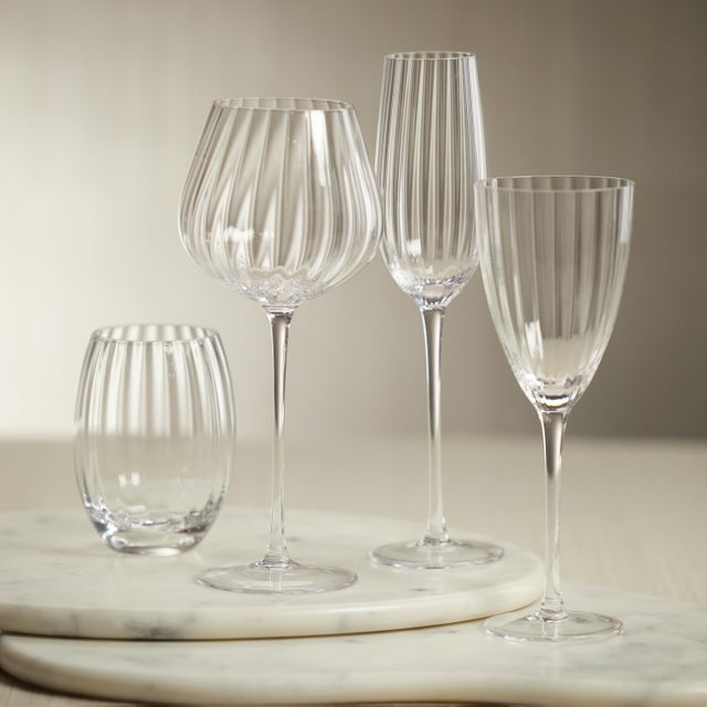 Madeleine Optic Red Wine Glass- Clear- Set Of Four A modern twist on a timeless silhouette, these stemmed wine glasses...