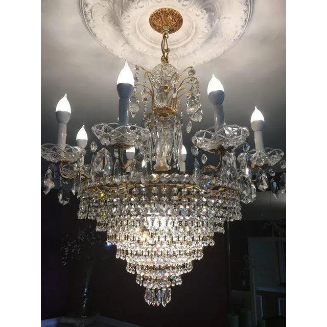 Possible Swarovski tiered chandelier. Located in our Garden City Location is this multiple tiered chandelier having what...