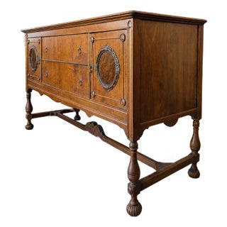 Antique Jacobean Revival Figured Wood Sideboard With Carved Medallions For Sale