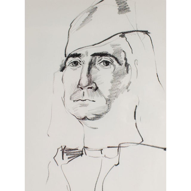 A charcoal portrait drawing by the American artist James L. Bruch (1942-2023). This portrait depicts a man wearing a...
