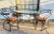 This is a postmodern tubular black metal frame dining table with 4 matching Chairs by Cali-Style. The chairs and table...