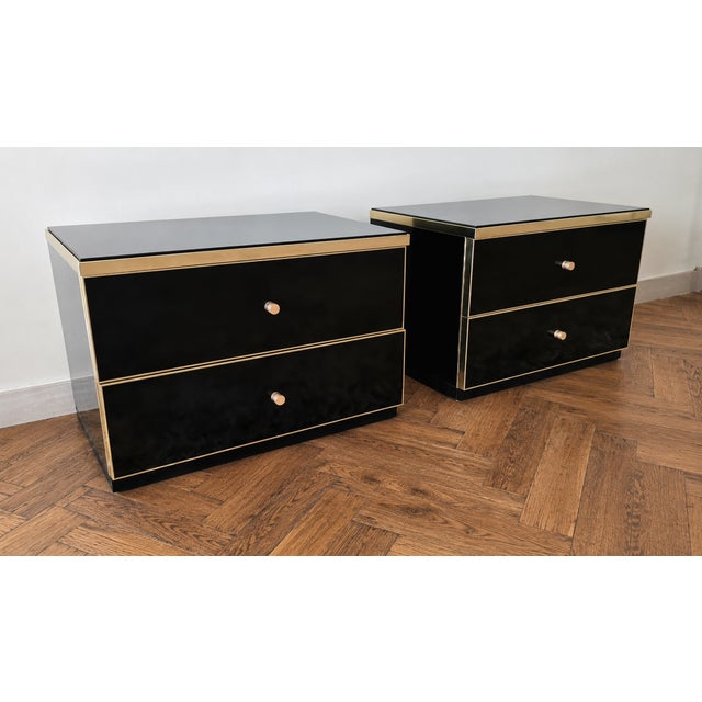Pair of bedside tables by maison roméo, paris, attributed to jean-claude mahey, dating from the 1970s. each table features...
